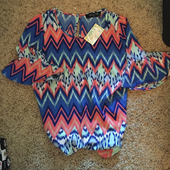 Cute bell sleeve multicolored blouse. Size medium