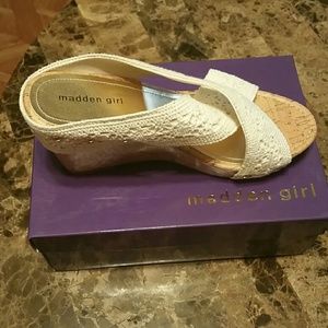 Off white wedges with crochet straps.