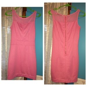 pink dress with gold dots.