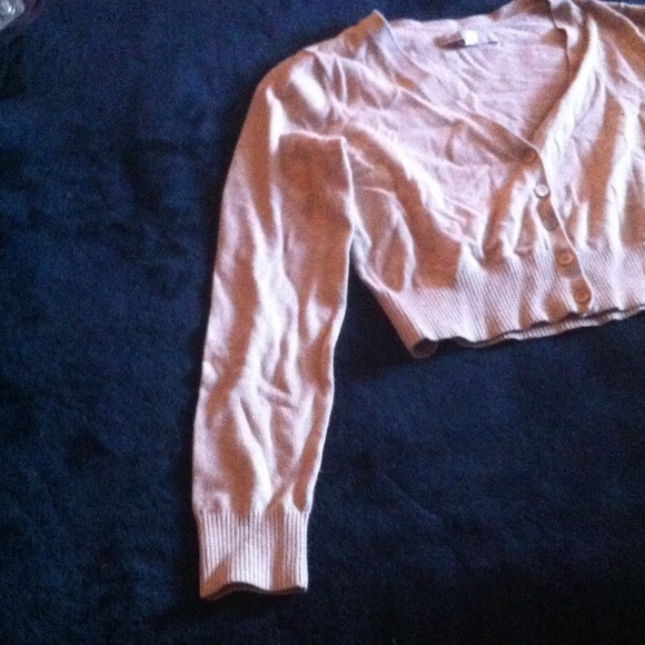 A tan cardigan - Picture 2 of 3