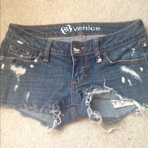 Distressed denim shorts