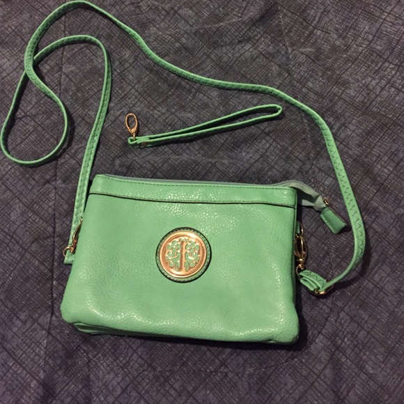 Very small but cute mint green purse!