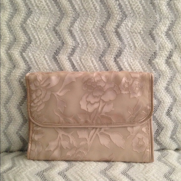 Bath and Body works hanging cosmetic travel purse.