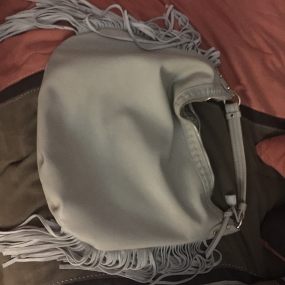 Tan Moda Luxe purse.