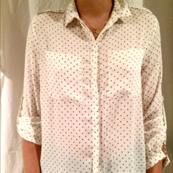 White longslevee with black poke-a-dot shirt