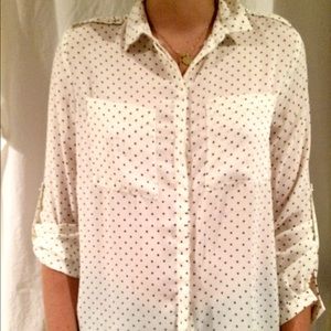 White longslevee with black poke-a-dot shirt