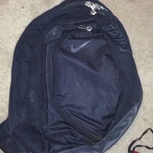 Black and grey Nike backpack
