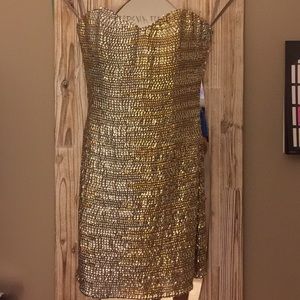 Gold And silver dress. Worn once for a dance.