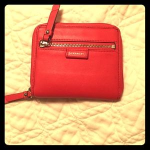 Burnt orange Coach wallet