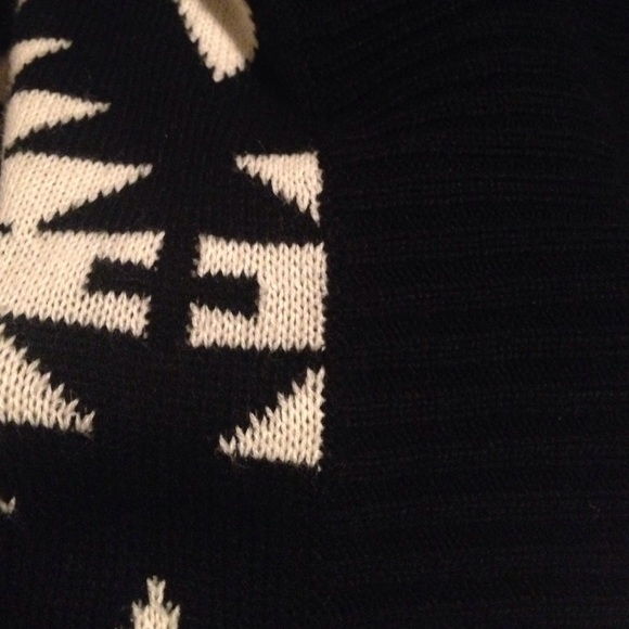 An oversize black and white cardigan. - Picture 3 of 3