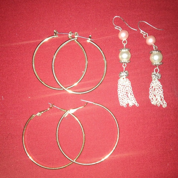 2 sets of hoop earings and 1 set of other