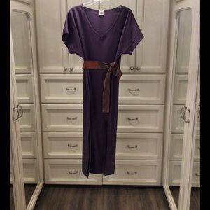 Purple dress with side slits.