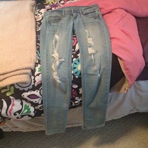 Skinny stretch light jeans w/ rips