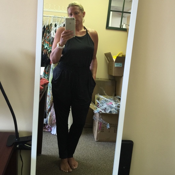 Black pocketed jump suit open back