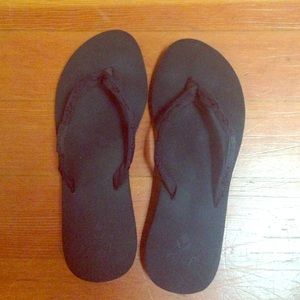 Black reef flip flops