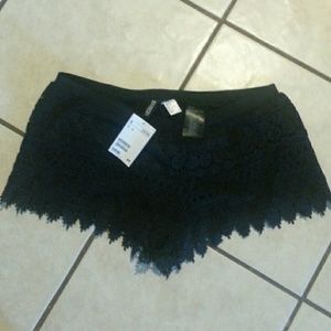 Size medium black crochet shorts