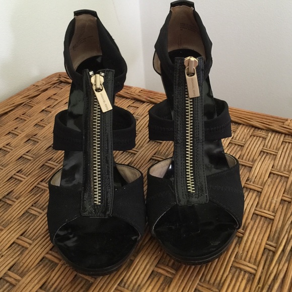 Price reduction! Michael Kors black zip up heels