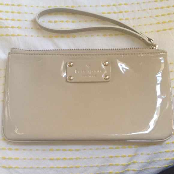 Kate Spade wristlet in beige.