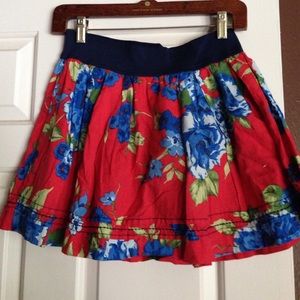 Red floral skirt.