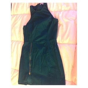 Tight teal dress with zipper by thigh