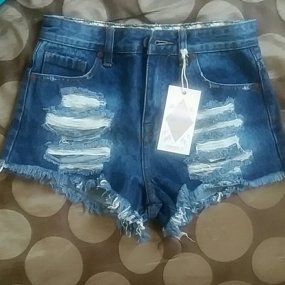 Distressed denim shorts