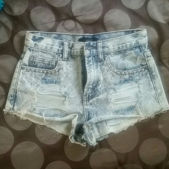 White denim distressed shorts