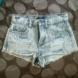 White denim distressed shorts