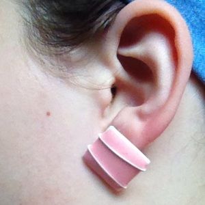 Pink and white earrings.