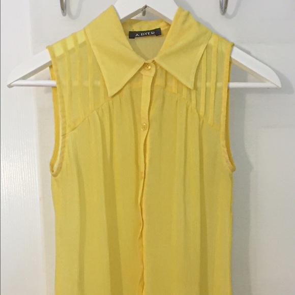 A. Byer chiffon yellow blouse, tapered length