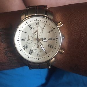 Gold and cream fossil watch