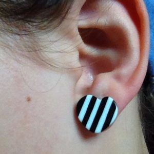 Black and white striped heart earrings.