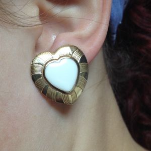 Gold and cream heart earrings.