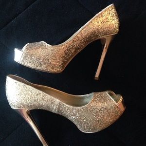 Gold sparkly high heels