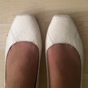 White leather flats