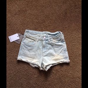 Lip service high waisted light distressed denim