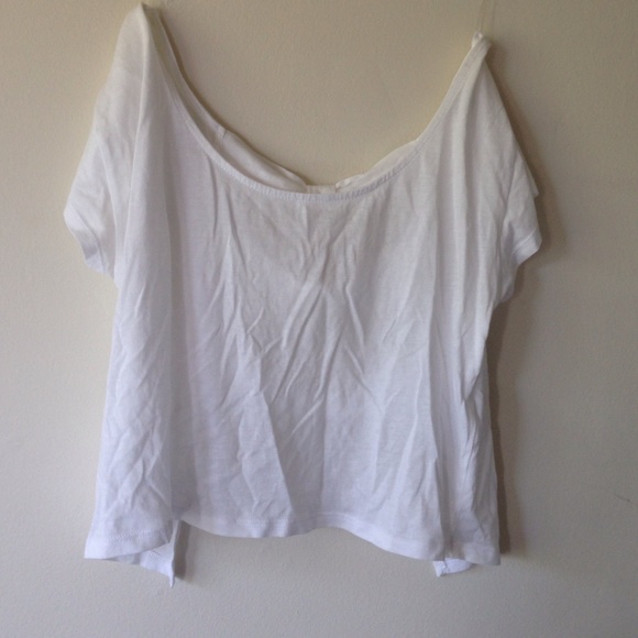 White crop top with open back bow design