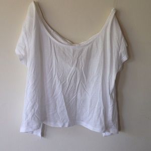 White crop top with open back bow design