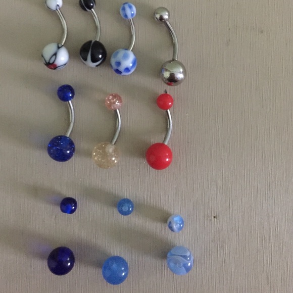 7 belly button rings + 3 extra removable balls