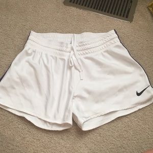 White Nike shorts