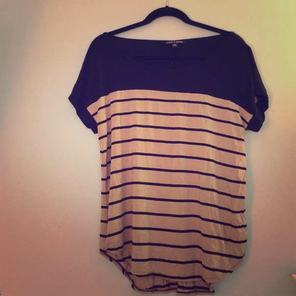 Beige and black shirt with a buttoned back