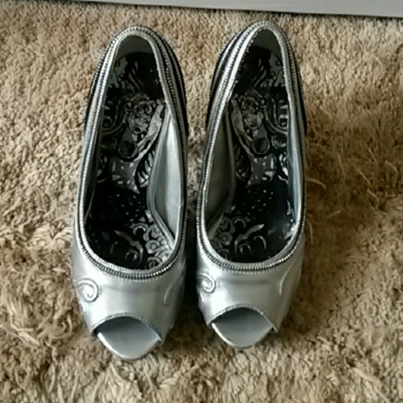 Silver  Ed Hardy heel. Size 6