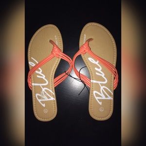 Orange/pink flip flops