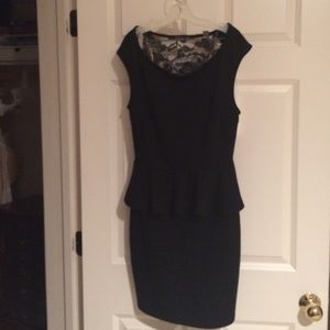 Black peplum dress with sheer gold open back mesh