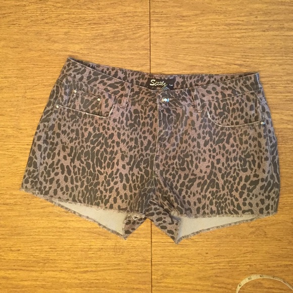 Grey/black animal print shorts.