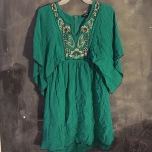 Embroidered long sleeved green dress