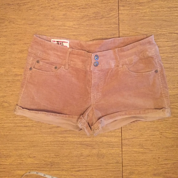 Beige, corduroy, button pocket shorts.