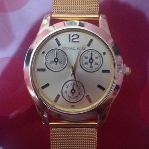 Gold mk watch