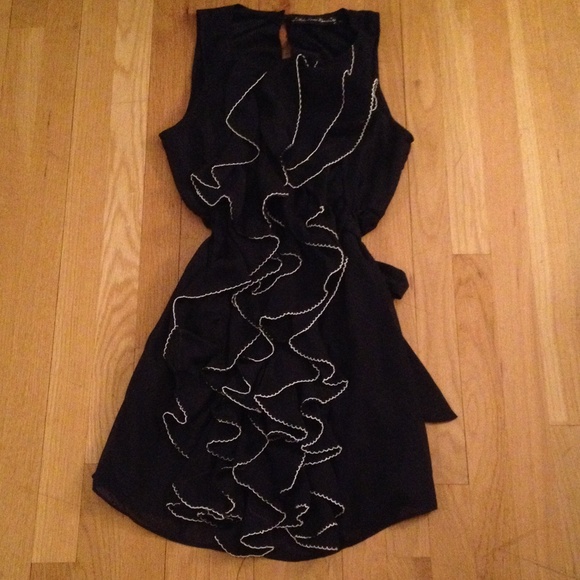 navy ruffled front dress with white piping