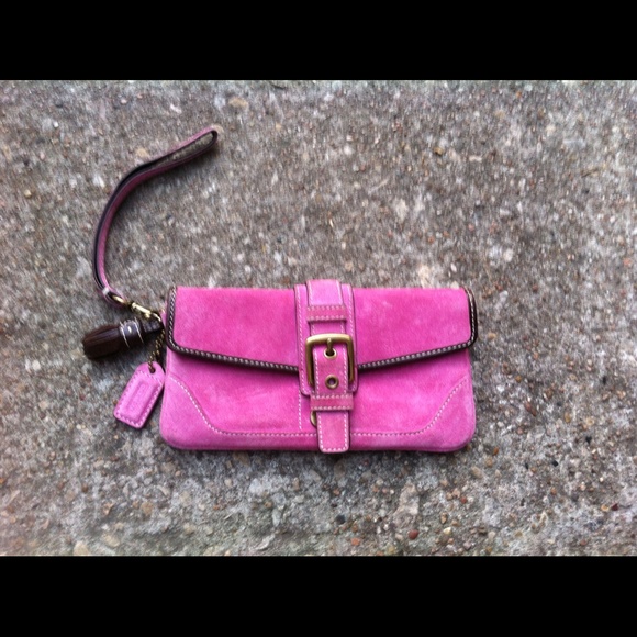 Coach pink suede wristlet.