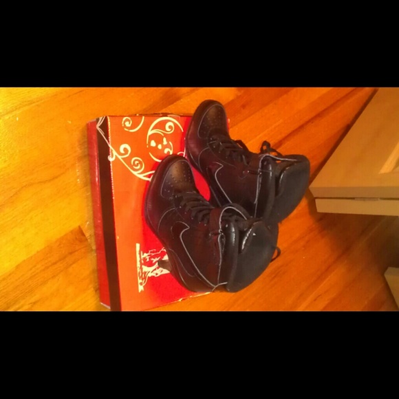 Nike heels and pelle pelle leather jacket.